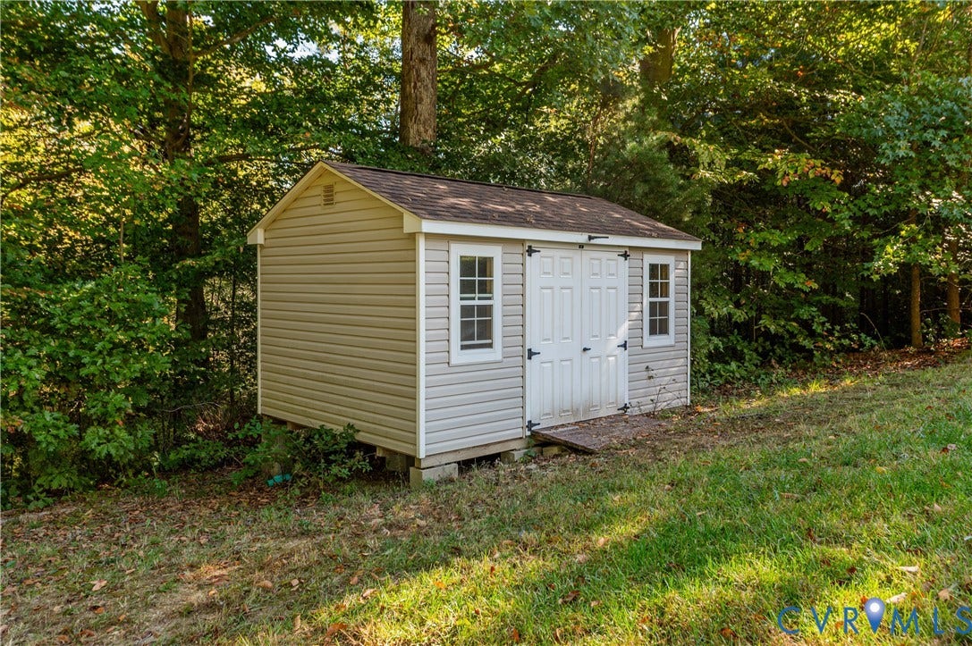 10041 POLLEN Drive, Hanover, Mechanicsville, VA 23116 Outdoor Shed with Double Doors and Ramp to accommodate a Riding Mower