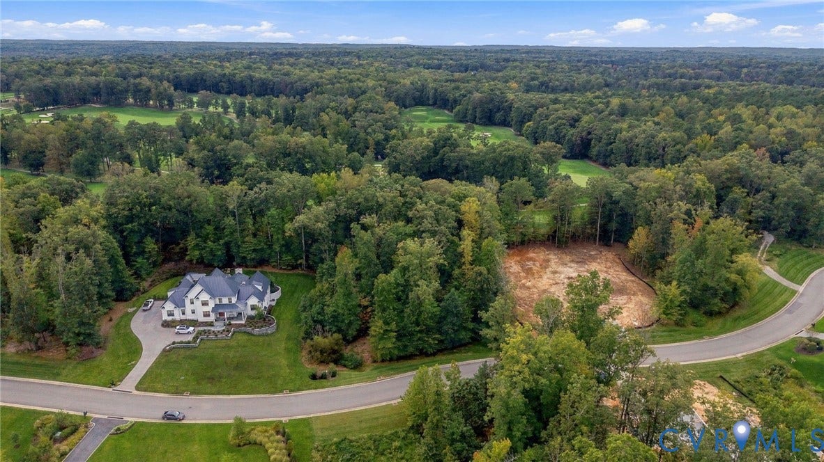 923 Kinloch Point Lane, Kinloch, Manakin Sabot, VA 23103 Expansive wooded setting featuring a large cleared lot and paved street frontage