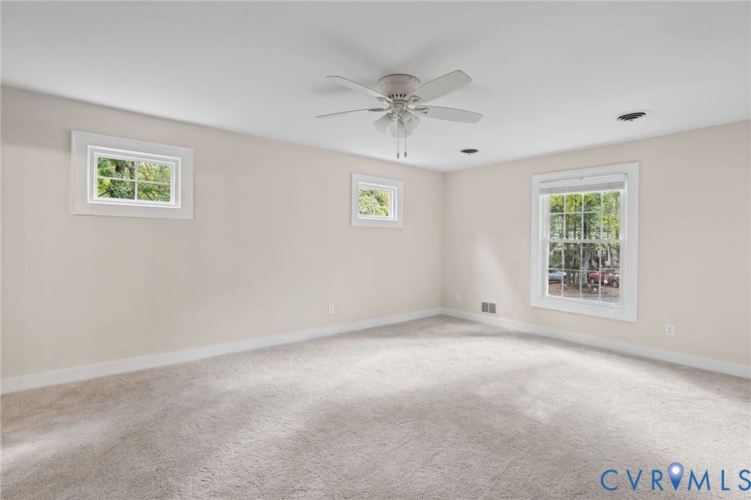 The primary bedroom boasts new carpet, fresh paint and an updated ensuite.