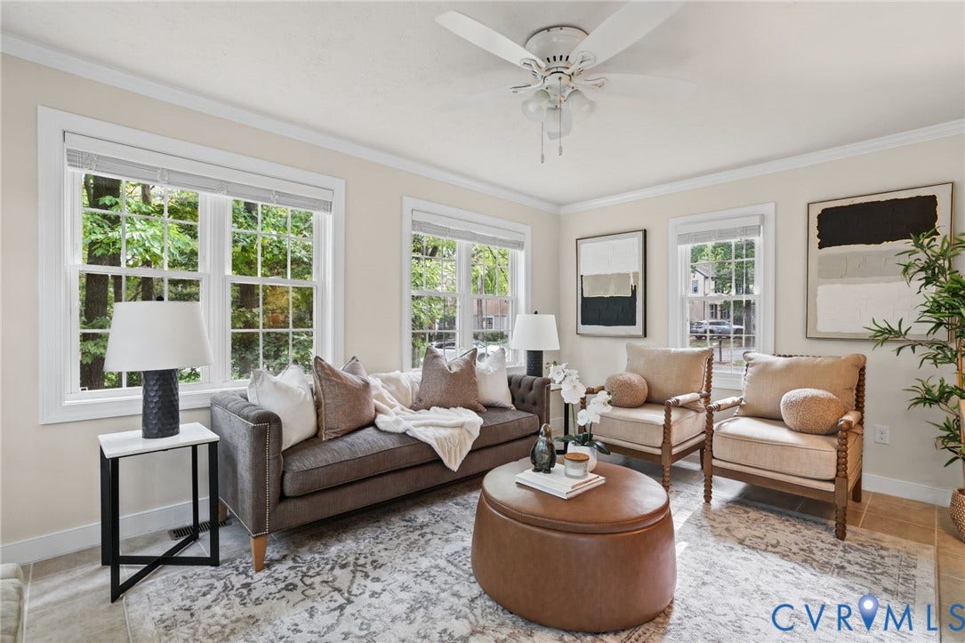 This light and bright sun room is right off of the kitchen and provides access to the outdoor patio.