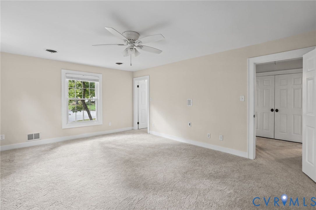 The primary bedroom boasts new carpet, fresh paint and an updated ensuite.
