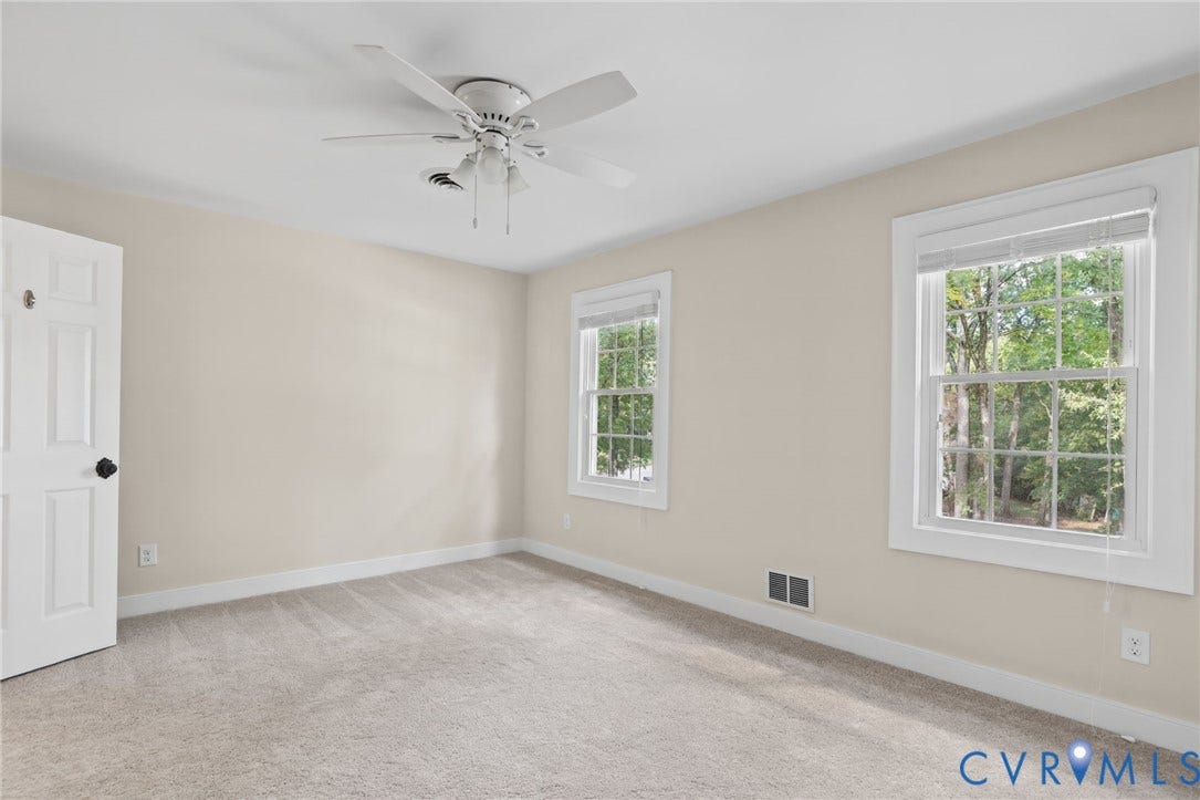 The primary bedroom boasts new carpet, fresh paint and an updated ensuite.