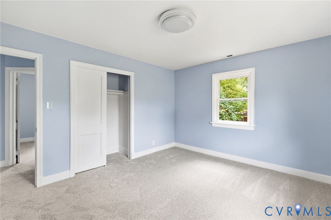 5901 Bonneau Road, Richmond, VA 23227 Light-toned carpet flooring, a single window with white trim, and a ceiling-mounted light fixture