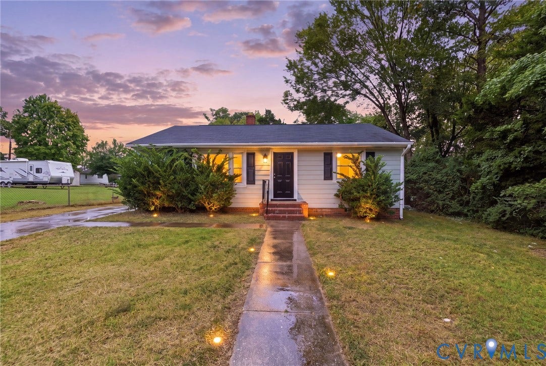 5901 Bonneau Road, Richmond, VA 23227 Single-story residence with light-colored siding, a dark roof, and a red brick entry