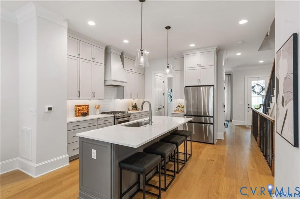 Large center island with seating offers a natural gathering place in the open kitchen.