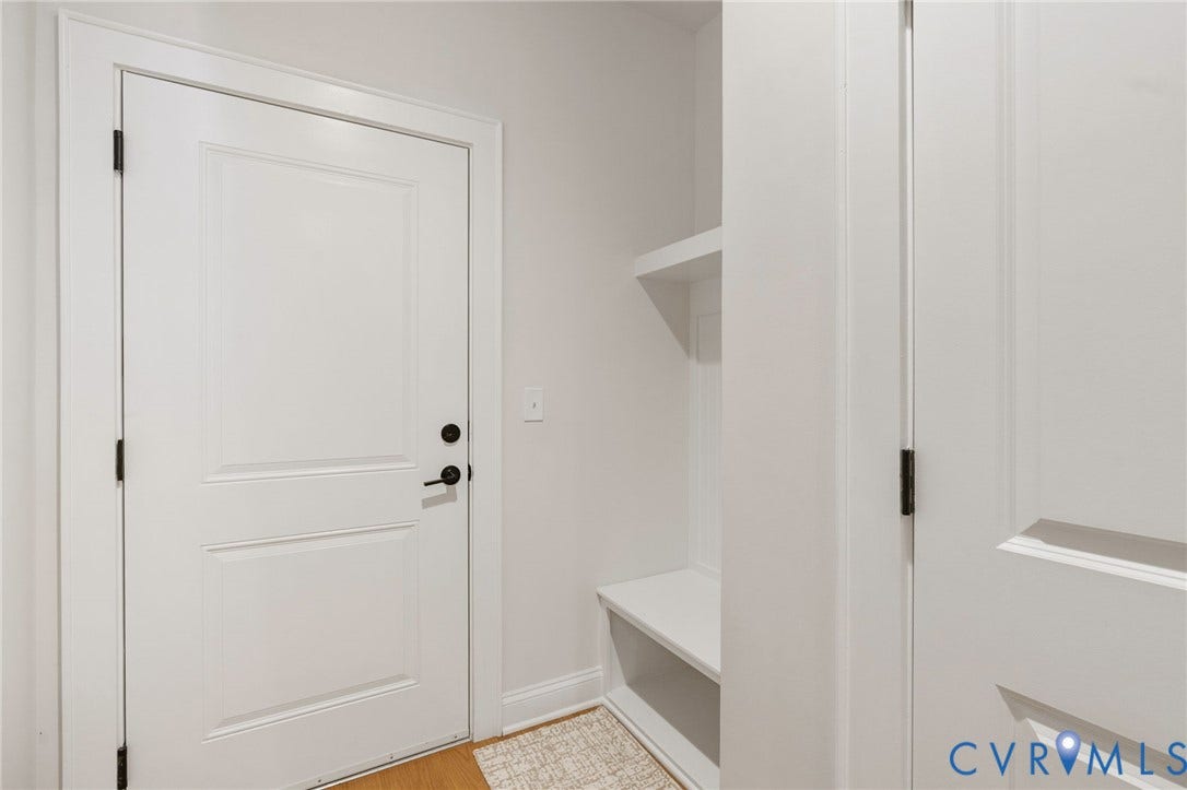 Lower level garage entrance and drop-zone
