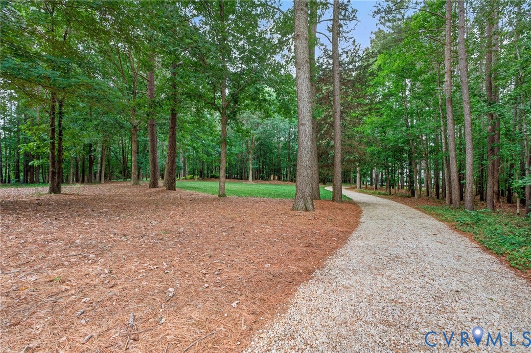 Winding driveway entrance to the property