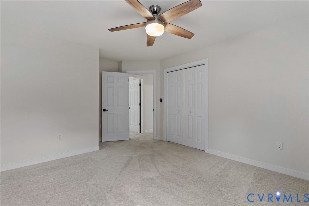 11100 Glen Hollow Court, Henrico, VA 23233 Recessed lighting fixture, light gray carpeting, bi-fold closet doors, four-panel interior doors, and a ceiling fan with light fixture