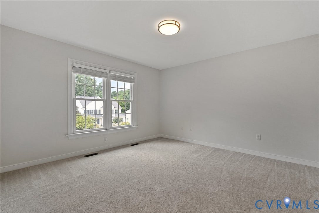11100 Glen Hollow Court, Henrico, VA 23233 Wall-to-wall carpeting, two windows with blinds, and a flush-mount ceiling light