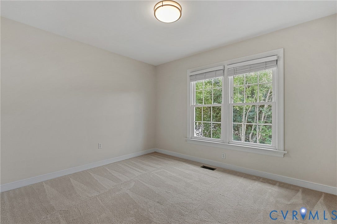 11100 Glen Hollow Court, Henrico, VA 23233 Neutral wall tones, carpet flooring, a flush-mount ceiling light fixture, and a double window with blinds