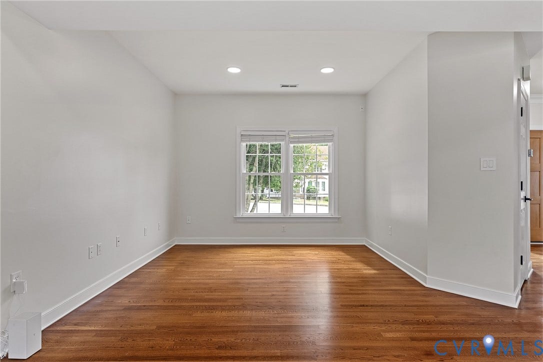 11100 Glen Hollow Court, Henrico, VA 23233 Hardwood flooring, recessed lighting, white trim, and a double window