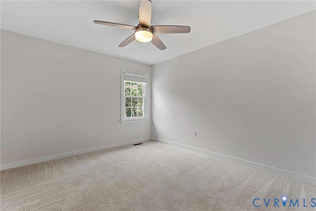 11100 Glen Hollow Court, Henrico, VA 23233 Neutral wall paint, plush carpeting, ceiling fan with integrated lighting, and a double-hung window