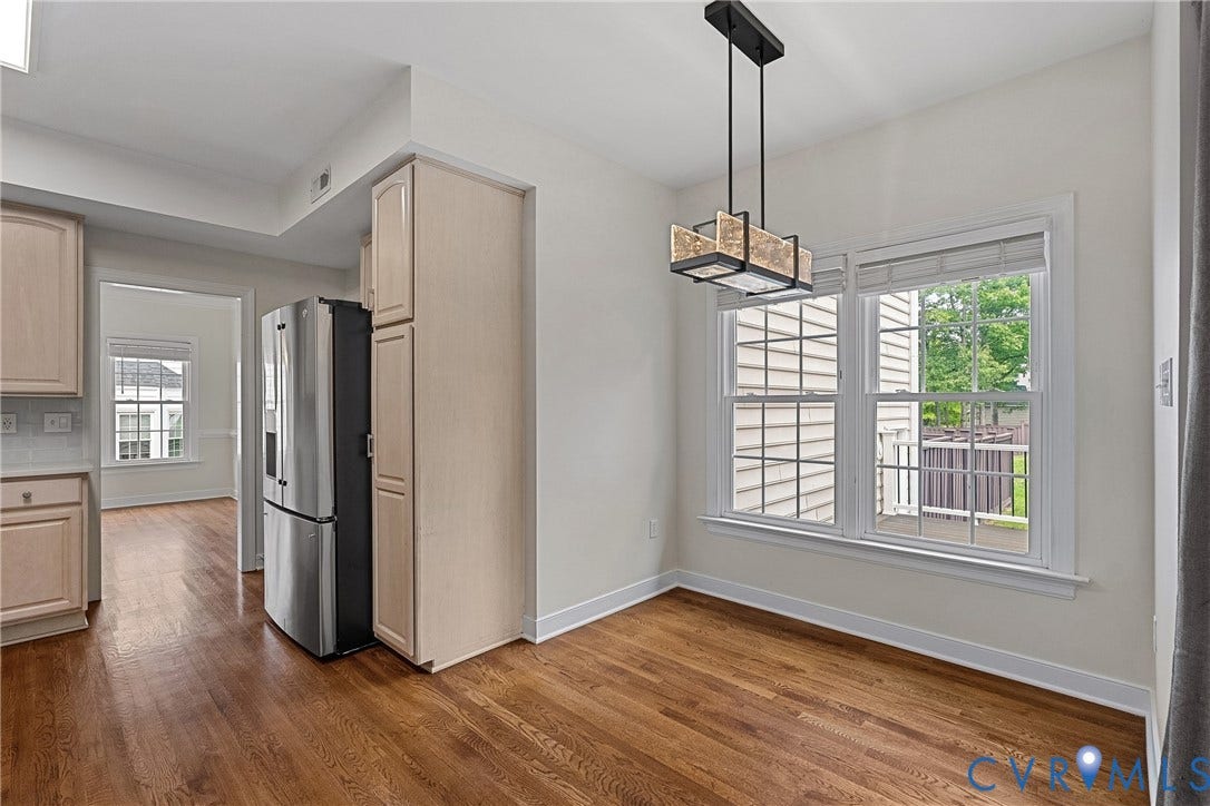 11100 Glen Hollow Court, Henrico, VA 23233 Wood-finish flooring, recessed lighting, double windows, stainless steel refrigerator, and ample cabinetry