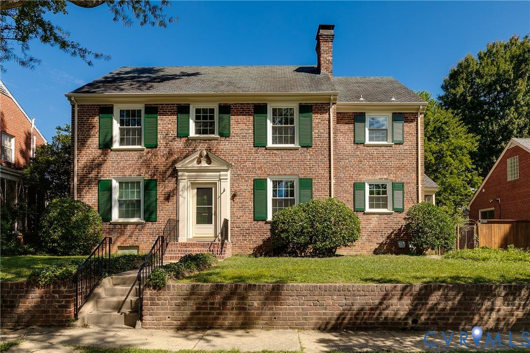 4010 Patterson Avenue, #1stfl, Richmond, VA 23221 Brick exterior with green shutters, a portico entry, wrought iron handrails, and a brick retaining wall