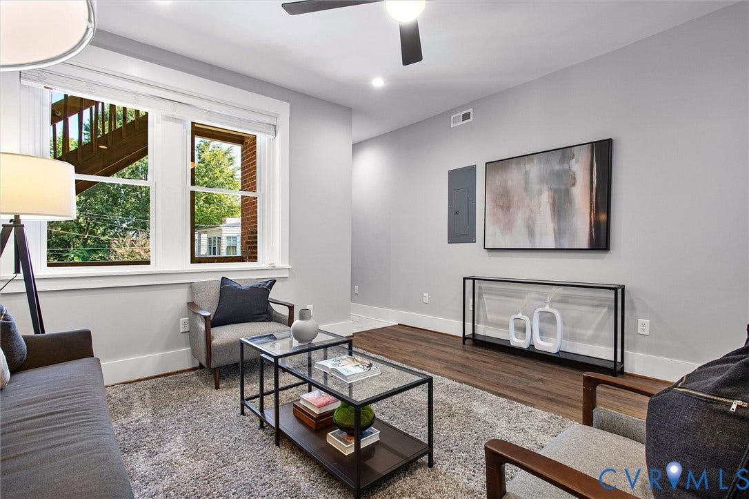 2902 Idlewood, #5, Richmond, VA 23221 Recessed lighting, ceiling fan, wood-finish flooring, white trim, and a console table