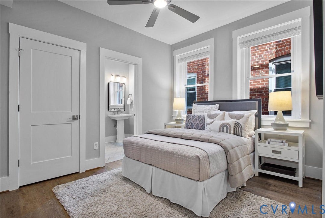 2902 Idlewood, #5, Richmond, VA 23221 Wood-finish flooring with light gray walls, white trim, and a ceiling fan