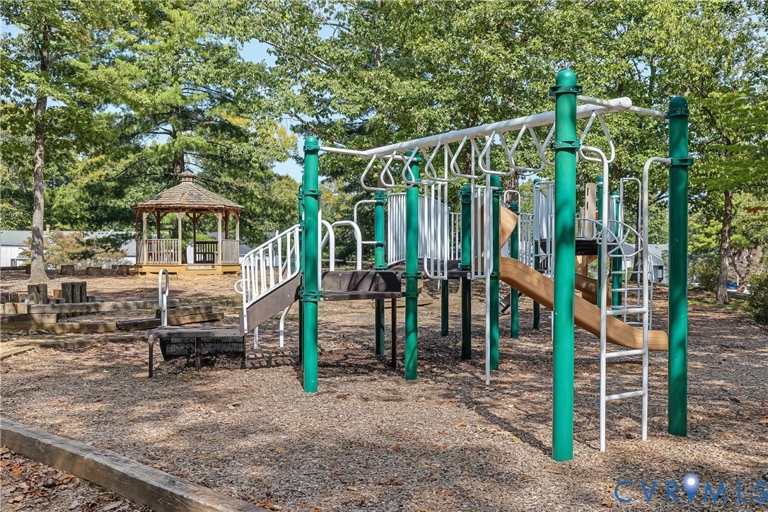 10272 Iron Mill Road, North Chesterfield, VA 23235 Recreational area featuring a playground structure with slides and monkey bars, a wood gazebo, and mature trees