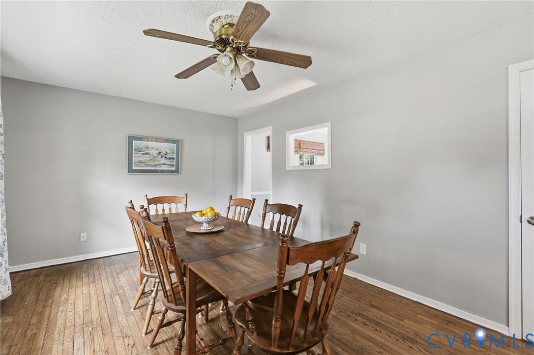 6723 Cherry Road, Woodhaven Shores, Quinton, VA 23141 Hardwood flooring, painted walls, ceiling fan, and framed opening