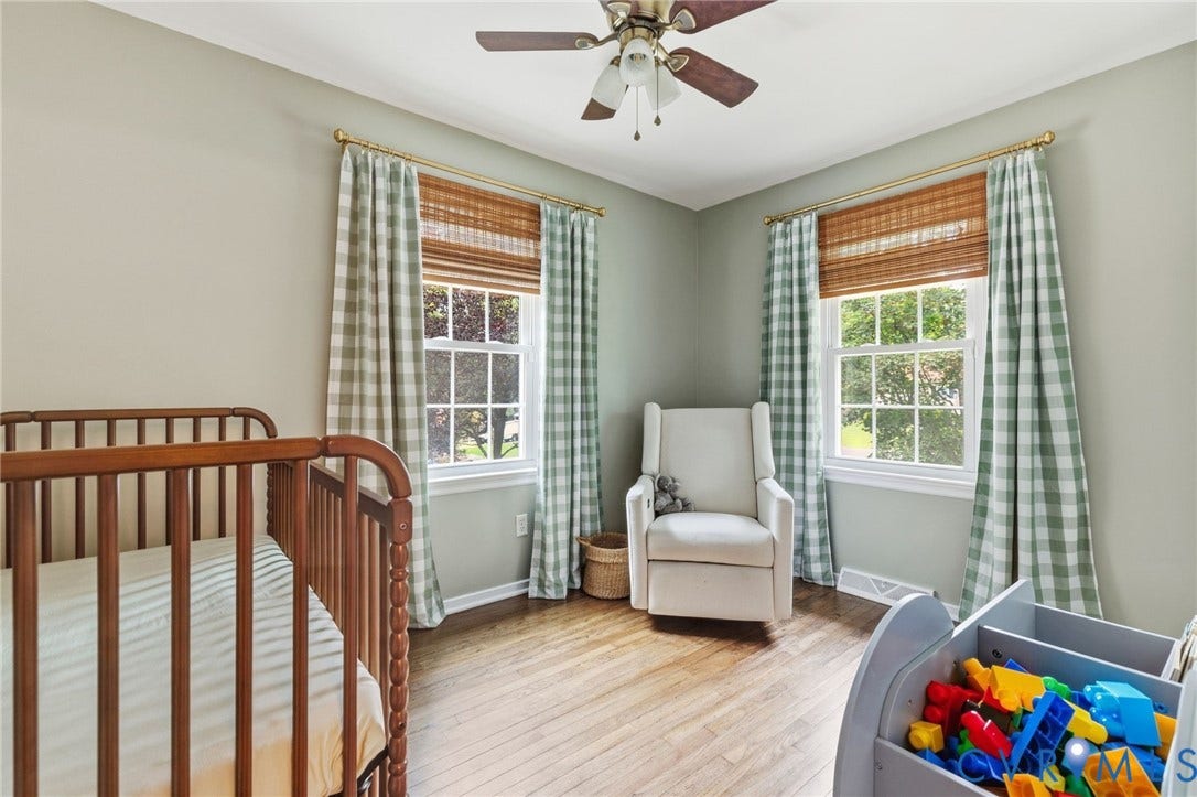 6723 Cherry Road, Woodhaven Shores, Quinton, VA 23141 Wood-finish flooring, ceiling fan, and two windows with blinds