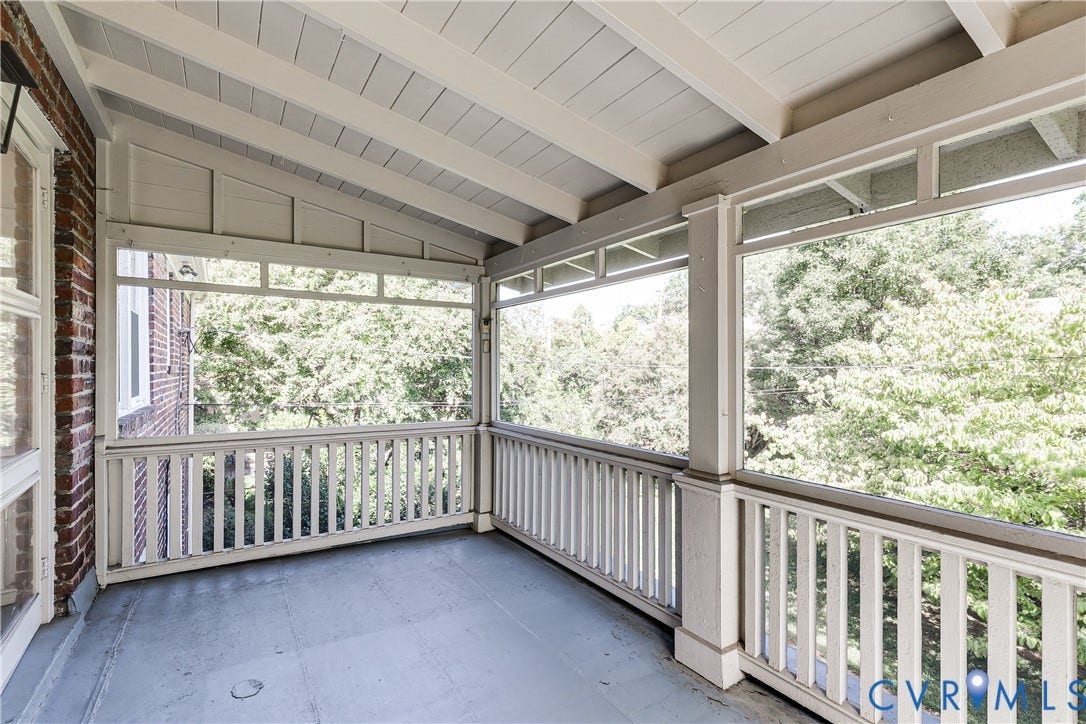 4010 Patterson Avenue, #2ndfl, Richmond, VA 23221 Enclosed porch featuring a painted wood ceiling, painted wood railing, and brick exterior wall