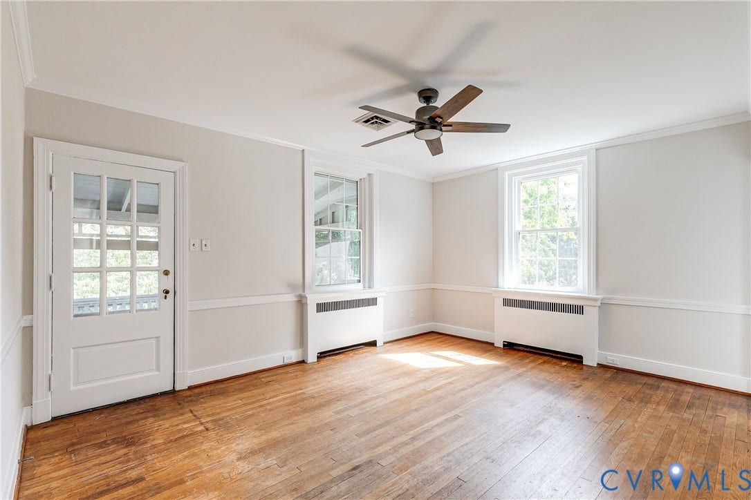 4010 Patterson Avenue, #2ndfl, Richmond, VA 23221 Hardwood flooring, crown molding, chair rail detailing, ceiling fan, and a glass-paneled door
