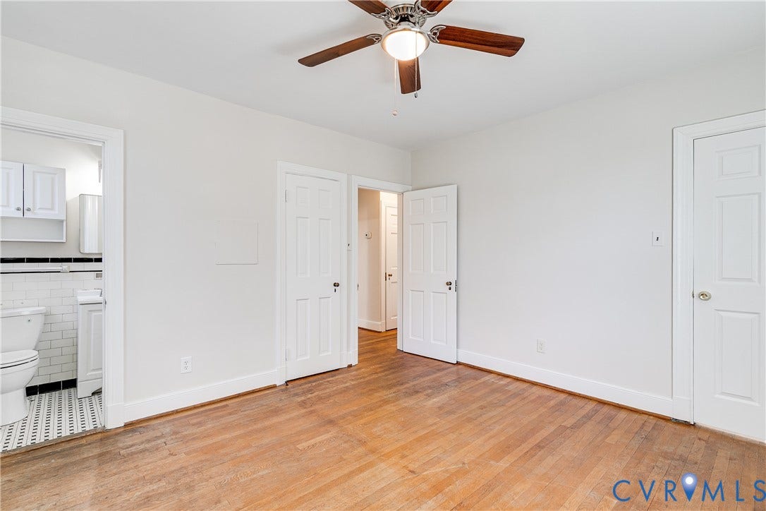 4010 Patterson Avenue, #2ndfl, Richmond, VA 23221 Hardwood flooring, ceiling fan with light fixture, white interior doors, and a bathroom featuring white subway tile and a black and white mosaic floor