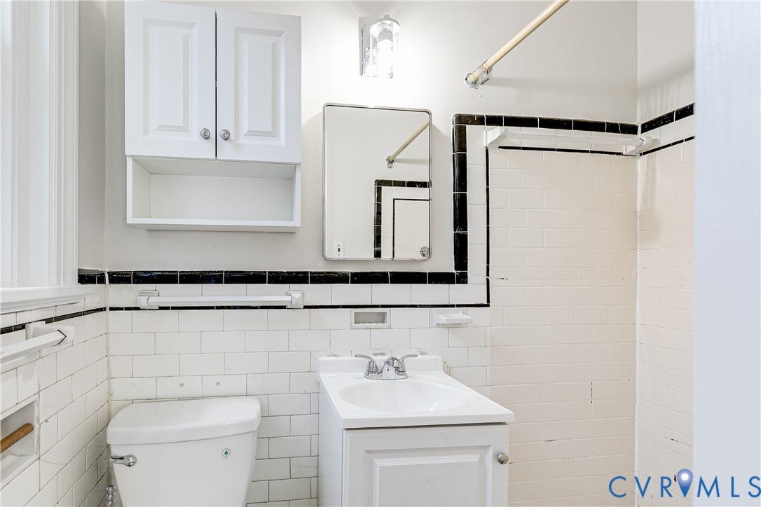 4010 Patterson Avenue, #2ndfl, Richmond, VA 23221 White subway tile walls with black accent trim
