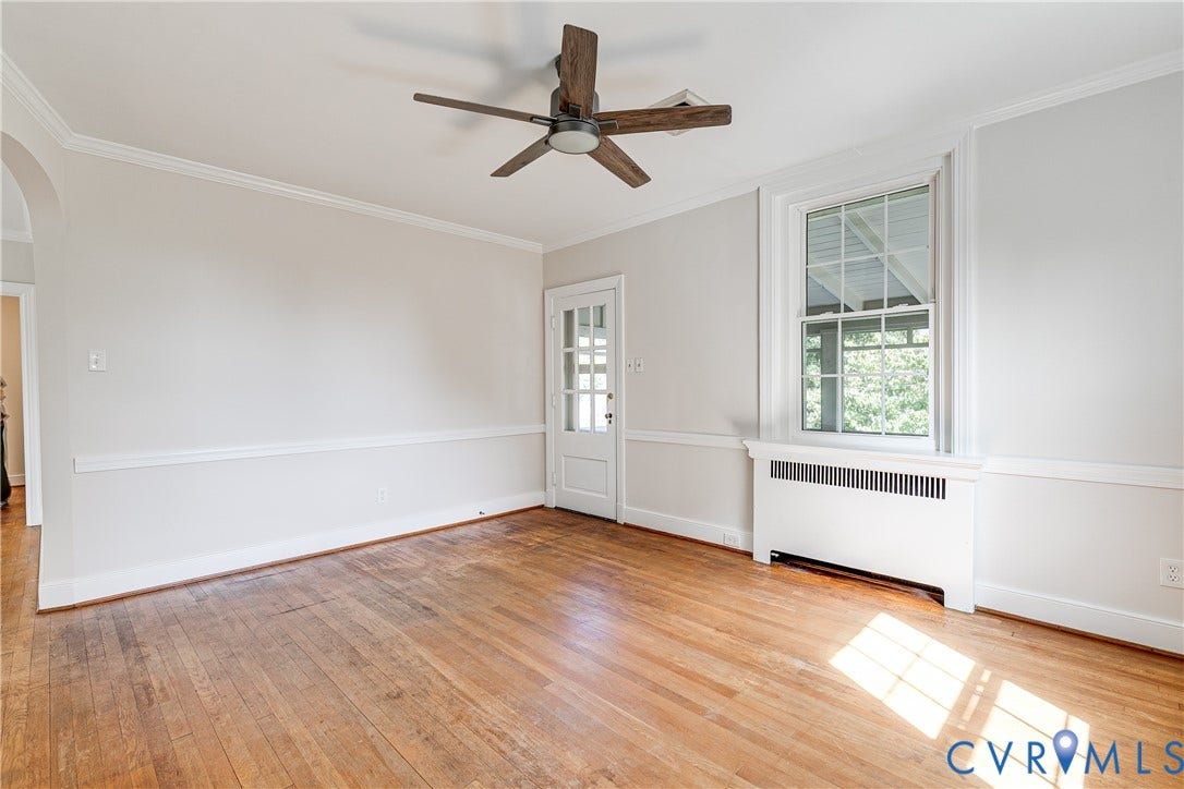 4010 Patterson Avenue, #2ndfl, Richmond, VA 23221 Wood-finish flooring, crown molding, chair rail molding, ceiling fan, and a glass-paneled door