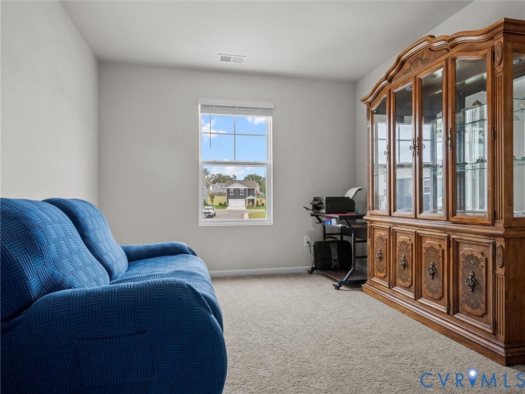 6901 Switch Cane Court, The Arbors, New Kent, VA 23141 Carpeted flooring with light-toned walls and a window