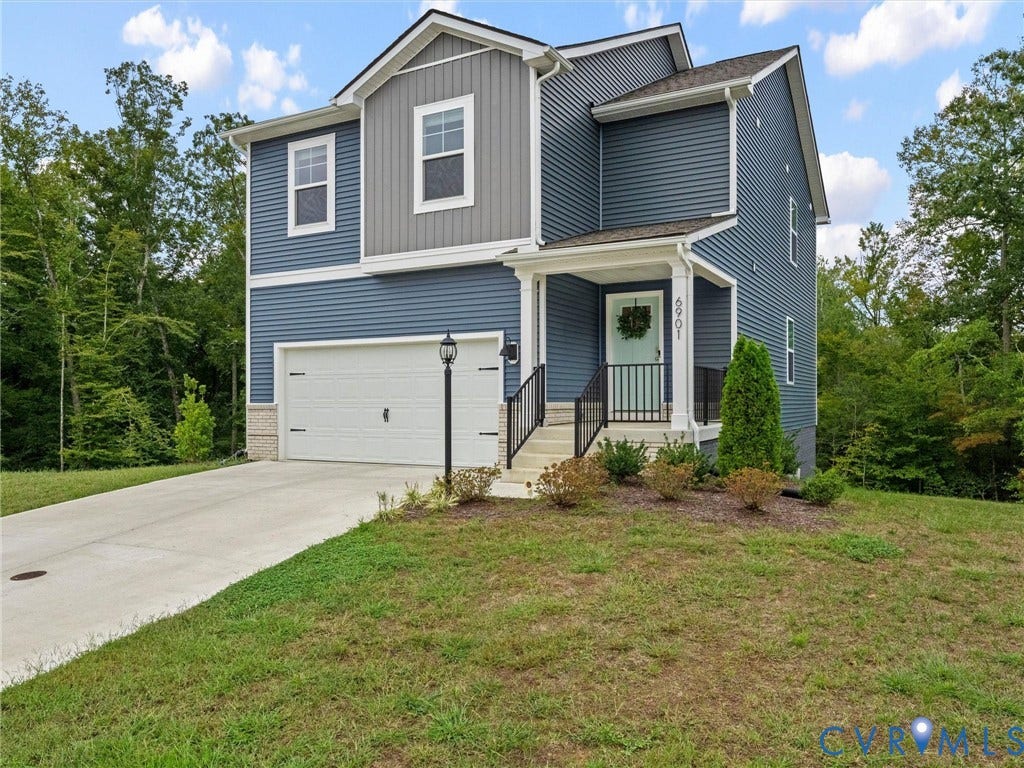 6901 Switch Cane Court, The Arbors, New Kent, VA 23141 Contemporary home with multi-toned siding, attached garage, covered entryway, concrete driveway, and front landscaping