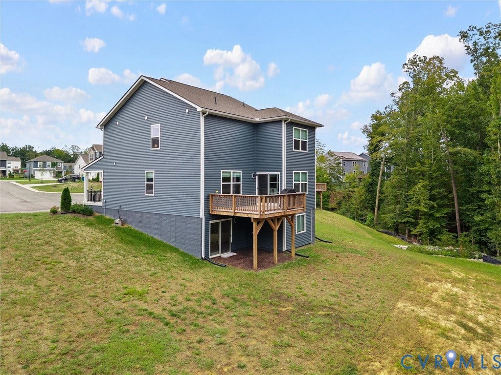 6901 Switch Cane Court, The Arbors, New Kent, VA 23141 Two-story residence featuring blue siding and a brown roof