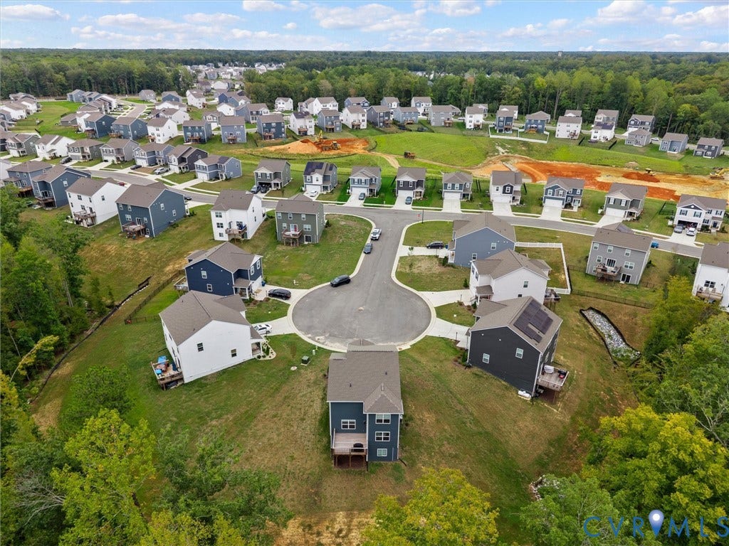 6901 Switch Cane Court, The Arbors, New Kent, VA 23141 Residential community featuring a cul-de-sac, multiple two-story homes, and a natural green landscape