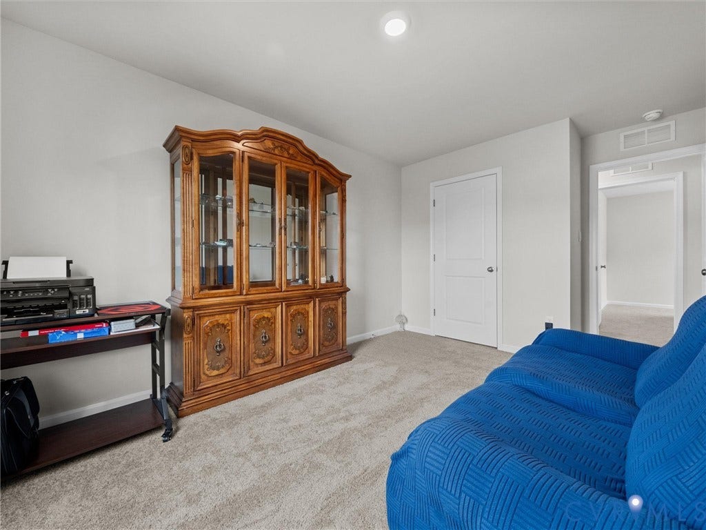 6901 Switch Cane Court, The Arbors, New Kent, VA 23141 Neutral wall color, recessed lighting, and carpet flooring