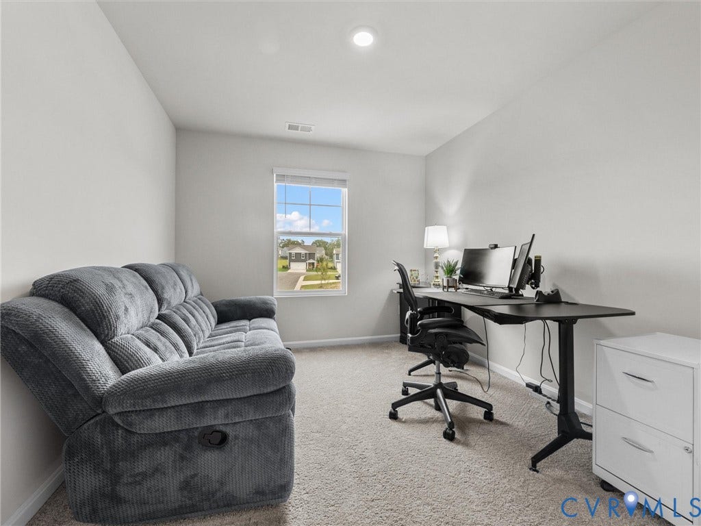 6901 Switch Cane Court, The Arbors, New Kent, VA 23141 Neutral wall paint, carpet flooring, and a single window