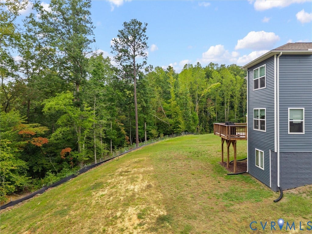 6901 Switch Cane Court, The Arbors, New Kent, VA 23141 Expansive grassy yard with mature trees