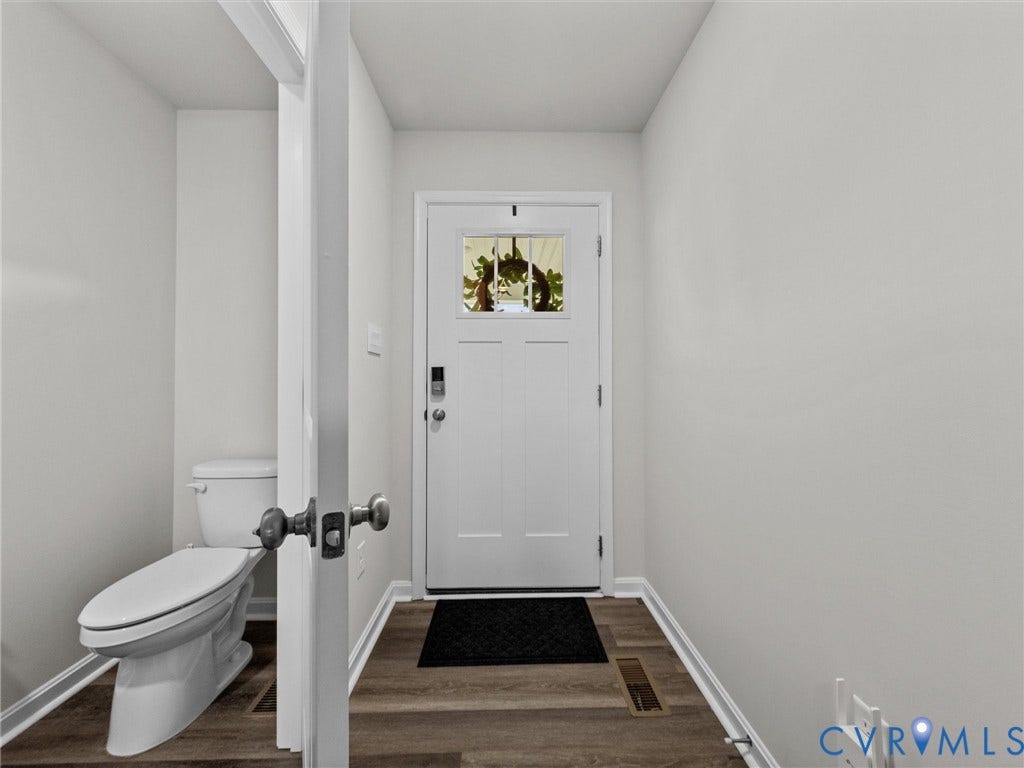 6901 Switch Cane Court, The Arbors, New Kent, VA 23141 Entryway featuring wood-finish flooring and a white paneled door with decorative glass