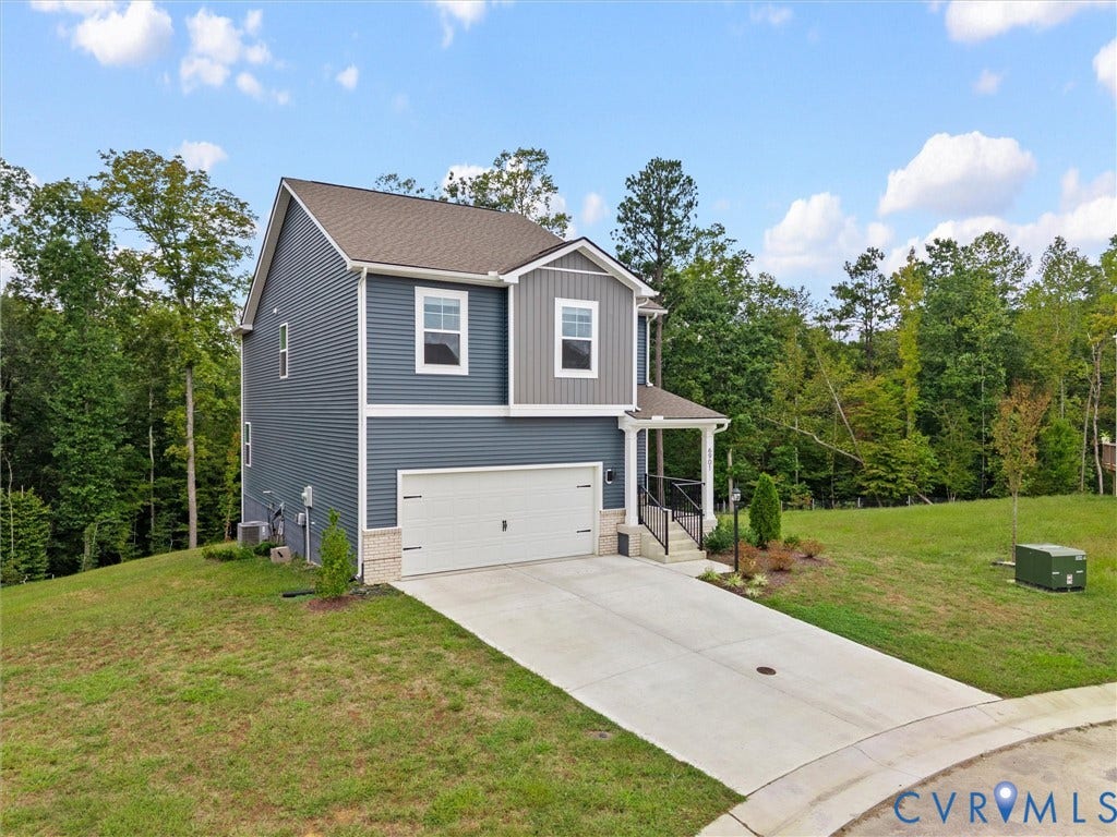 6901 Switch Cane Court, The Arbors, New Kent, VA 23141 Two-story residence featuring a two-tone siding exterior, an attached two-car garage, and a covered front entry