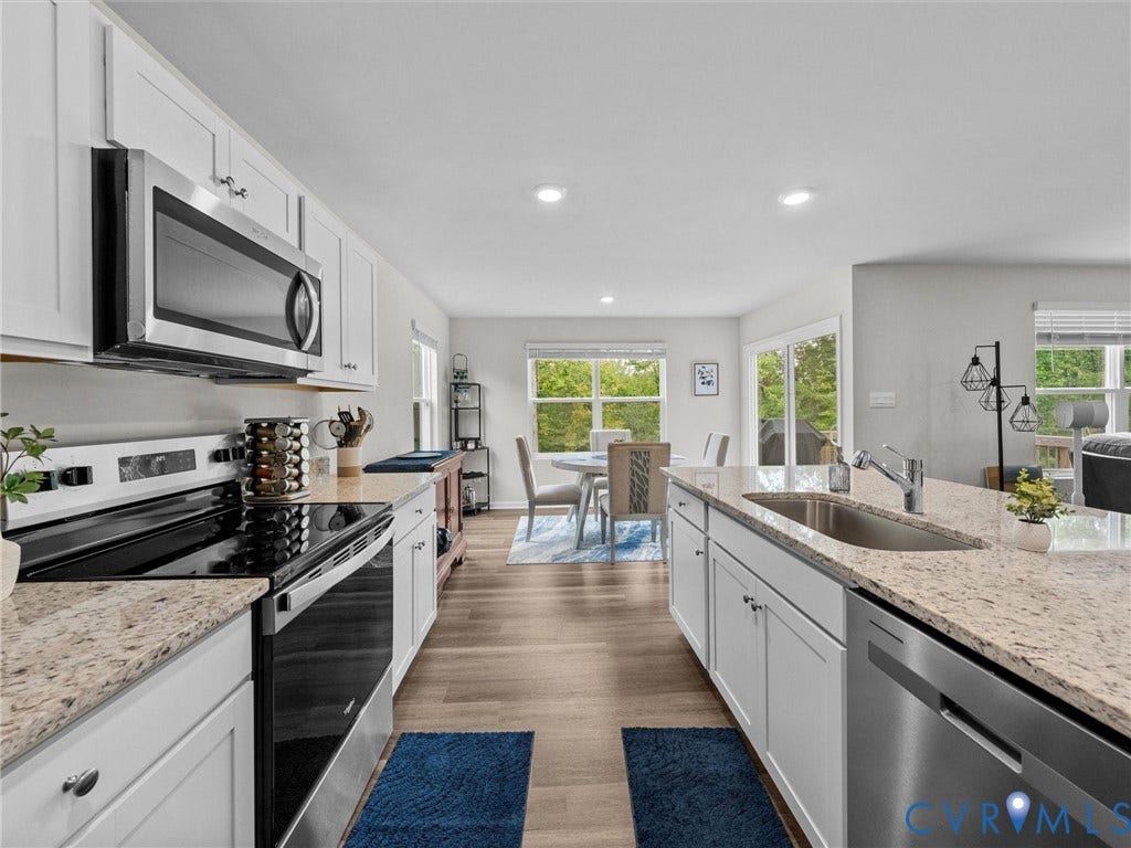 6901 Switch Cane Court, The Arbors, New Kent, VA 23141 Bright kitchen with white cabinetry and light-colored countertops