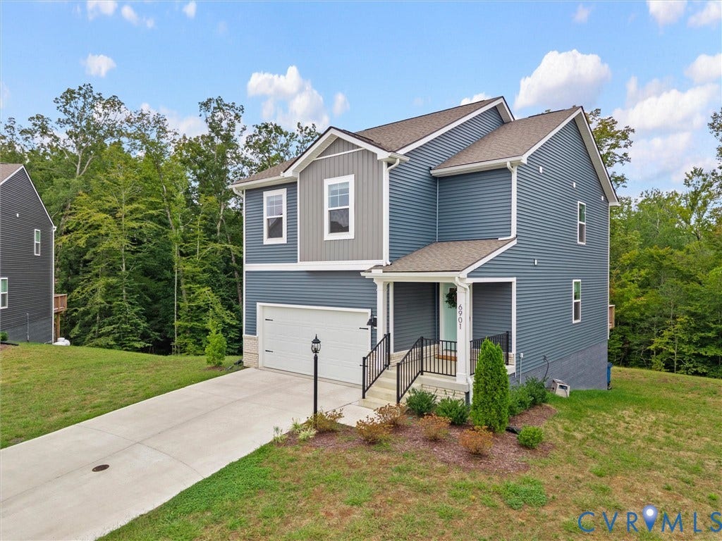 6901 Switch Cane Court, The Arbors, New Kent, VA 23141 Two-story residence featuring a covered front entry, attached garage, and a concrete driveway