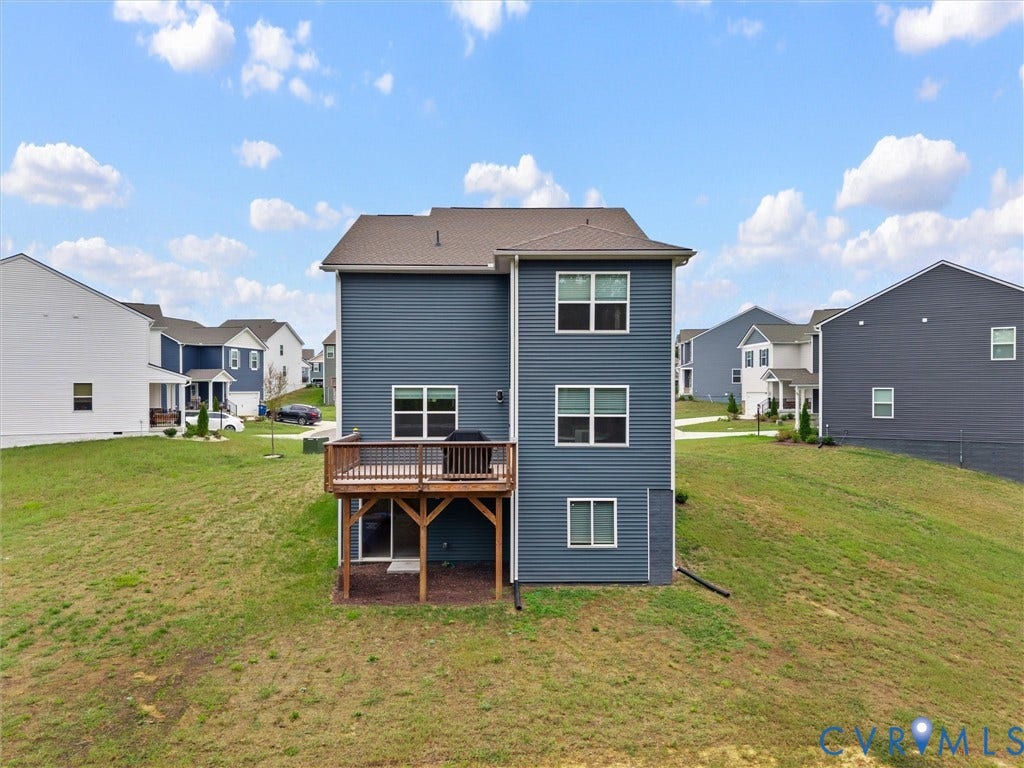 6901 Switch Cane Court, The Arbors, New Kent, VA 23141 Blue vinyl siding exterior with a brown shingle roof