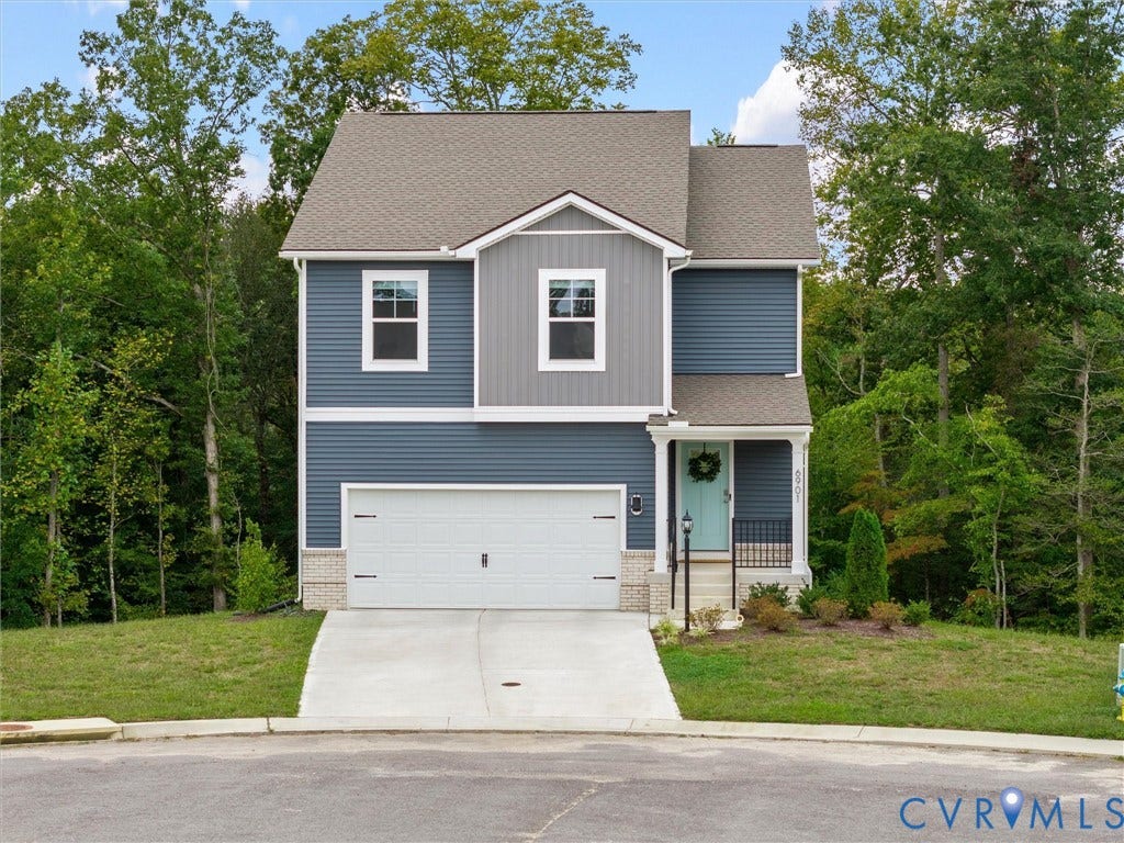 6901 Switch Cane Court, The Arbors, New Kent, VA 23141 Two-story residence featuring a covered entry, attached garage, and a concrete driveway