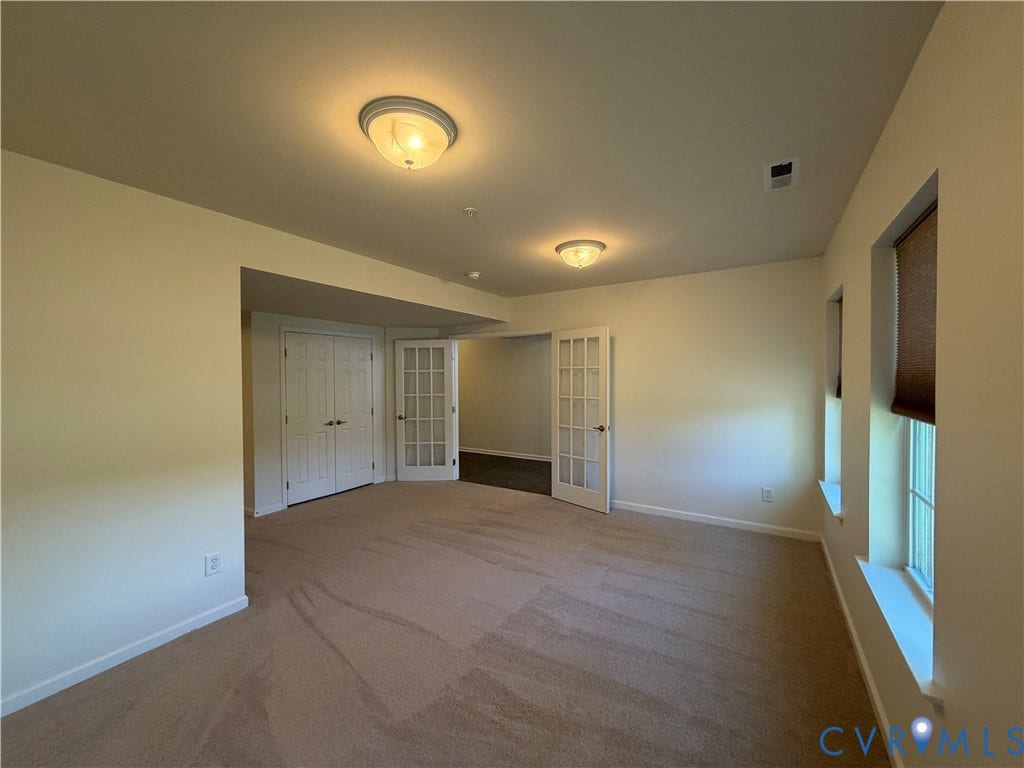 Entry level Flex space with full bathroom and closet.