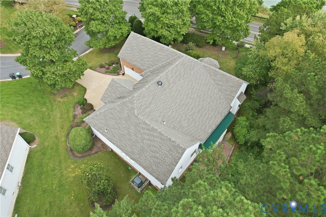 Single-family residence featuring a gabled roof and attached garage