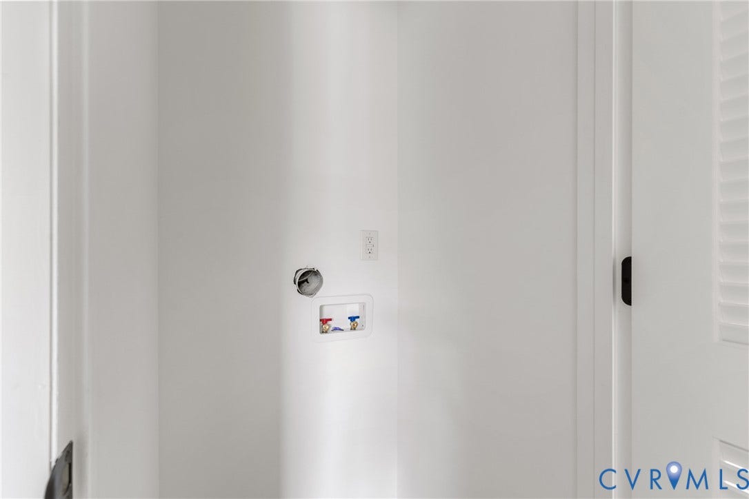 7402 Edgewood Avenue, Richmond, VA 23227 Laundry hookups with hot and cold water connections, 240-volt outlet, and a 120-volt outlet