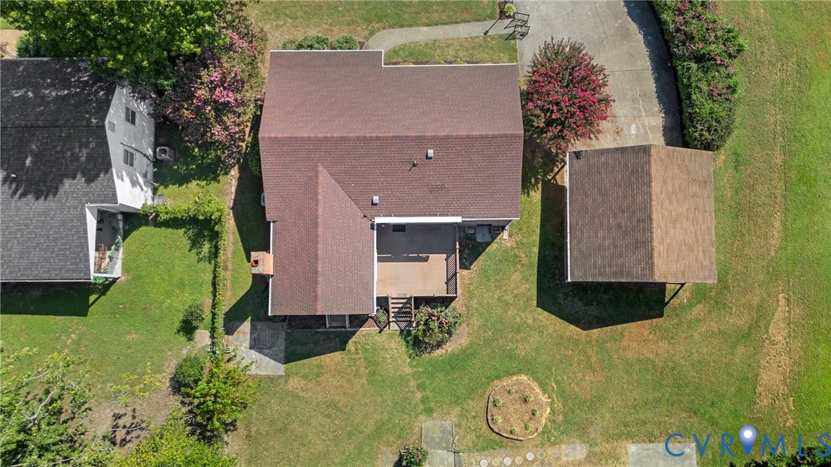 7402 Edgewood Avenue, Richmond, VA 23227 Brown shingle roof, exterior decking, and a separate covered carport