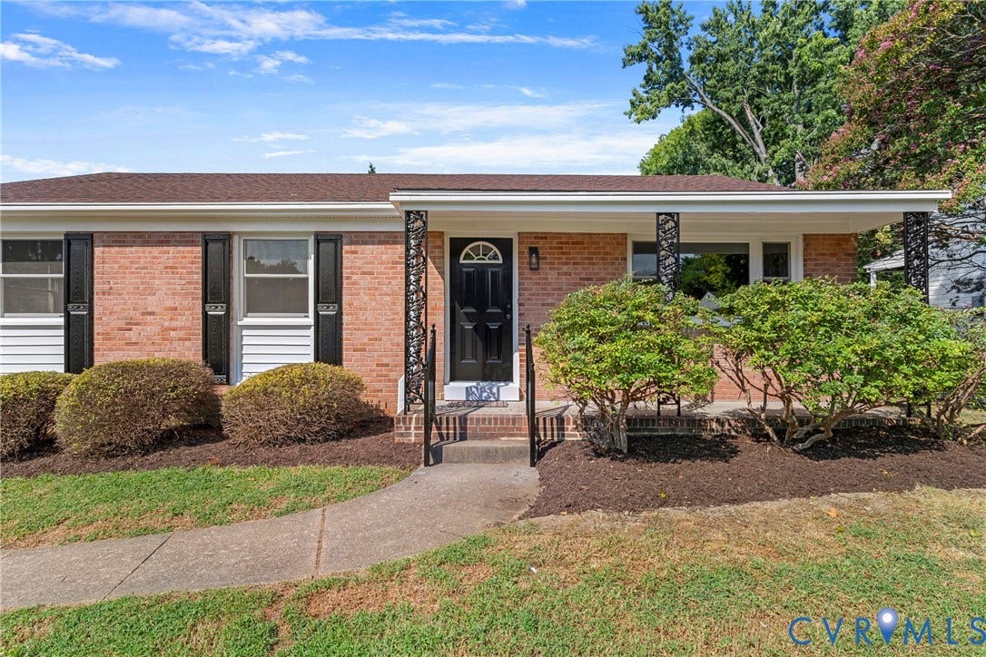 7402 Edgewood Avenue, Richmond, VA 23227 Brick exterior with white siding accents and a contrasting roof