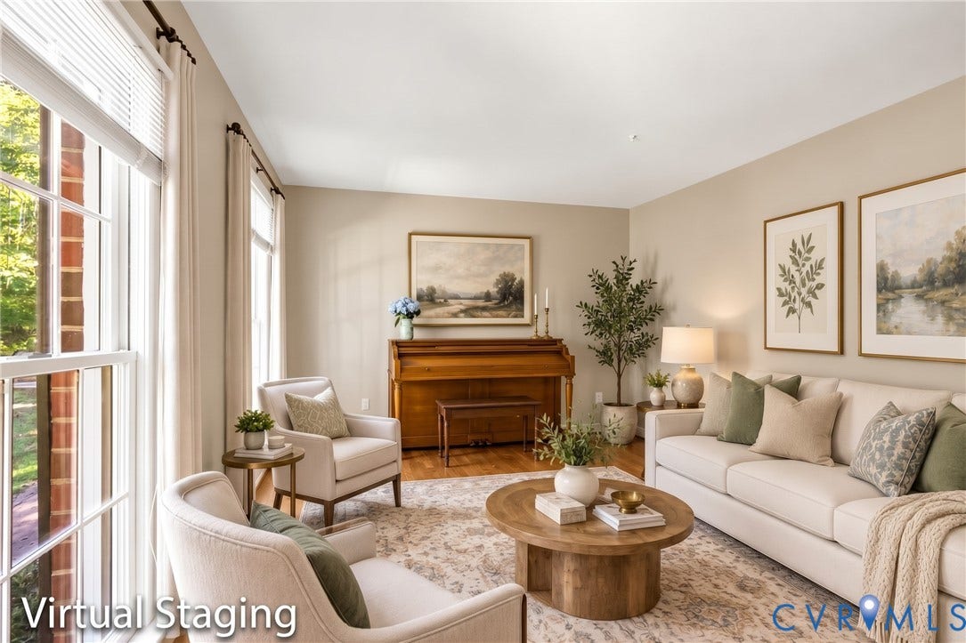 12082 Victoria Hills Road, Rockville, VA 23146 Living area featuring wood-finish flooring, tall multi-pane windows, and a brick-accented wall section