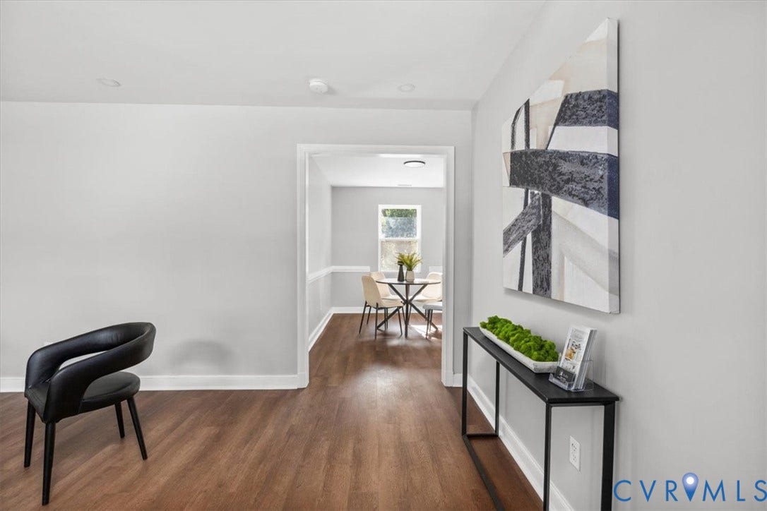 Wood-finish flooring, recessed lighting, and bright white trim