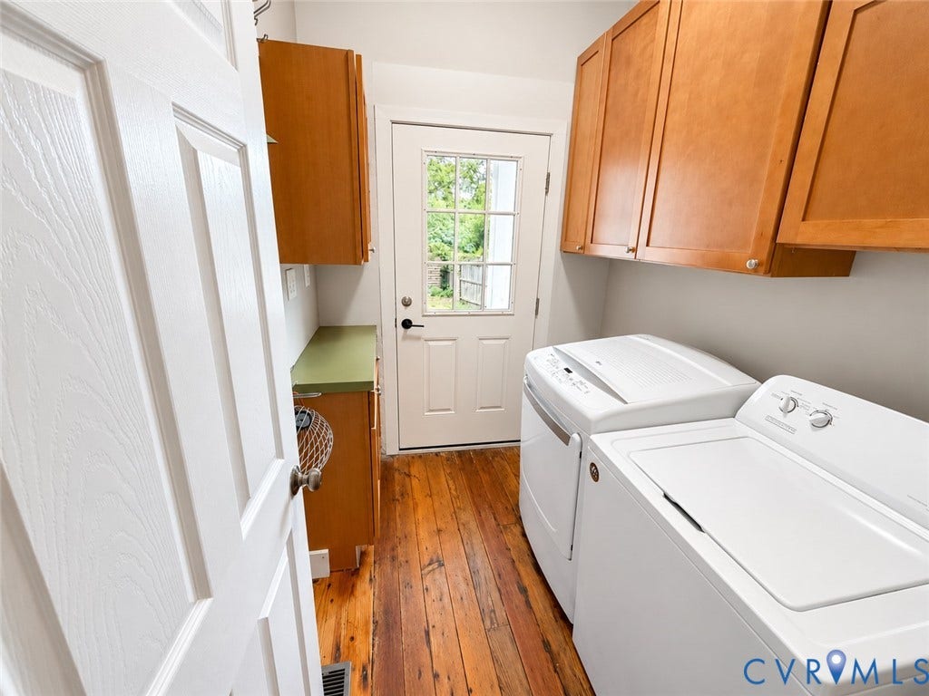 315 Grove Avenue, Petersburg, VA 23803 Wood-finish flooring, overhead cabinetry, and a countertop with built-in storage