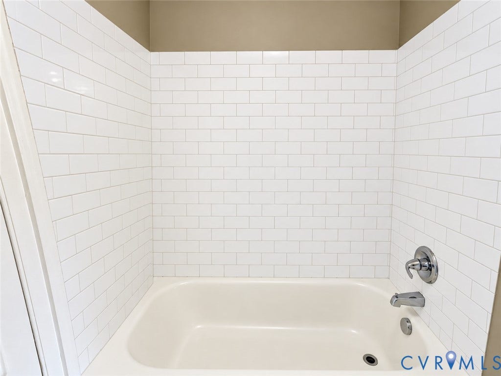 315 Grove Avenue, Petersburg, VA 23803 Bathtub with subway tile surround and chrome fixtures